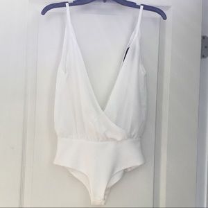 Rise of Dawn white tank top bodysuit. NWOT. XS